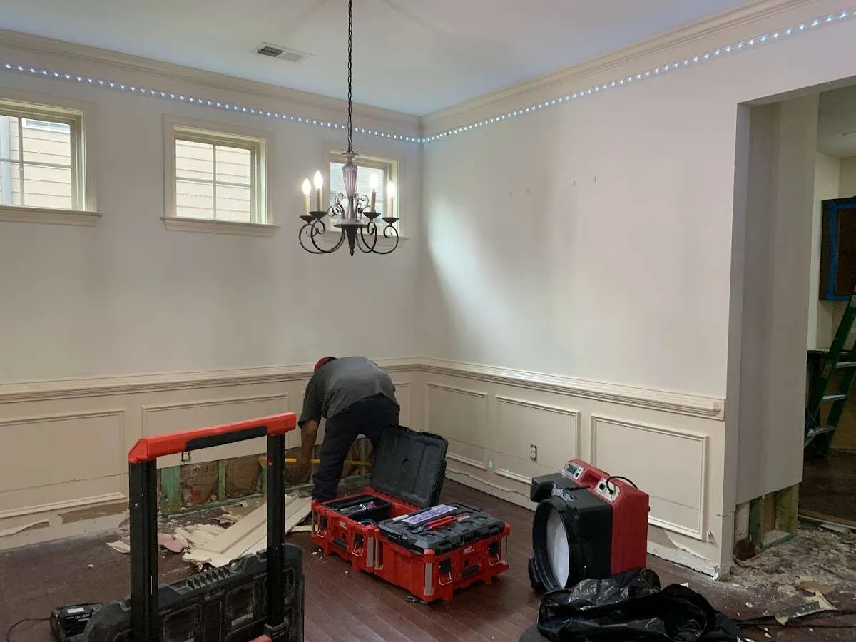 Restoration technician with professional equipment in Hartford